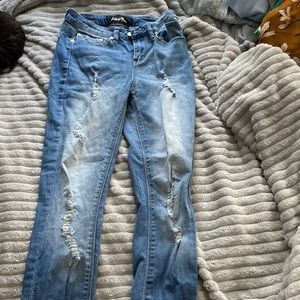 Blue ripped skinny jeans